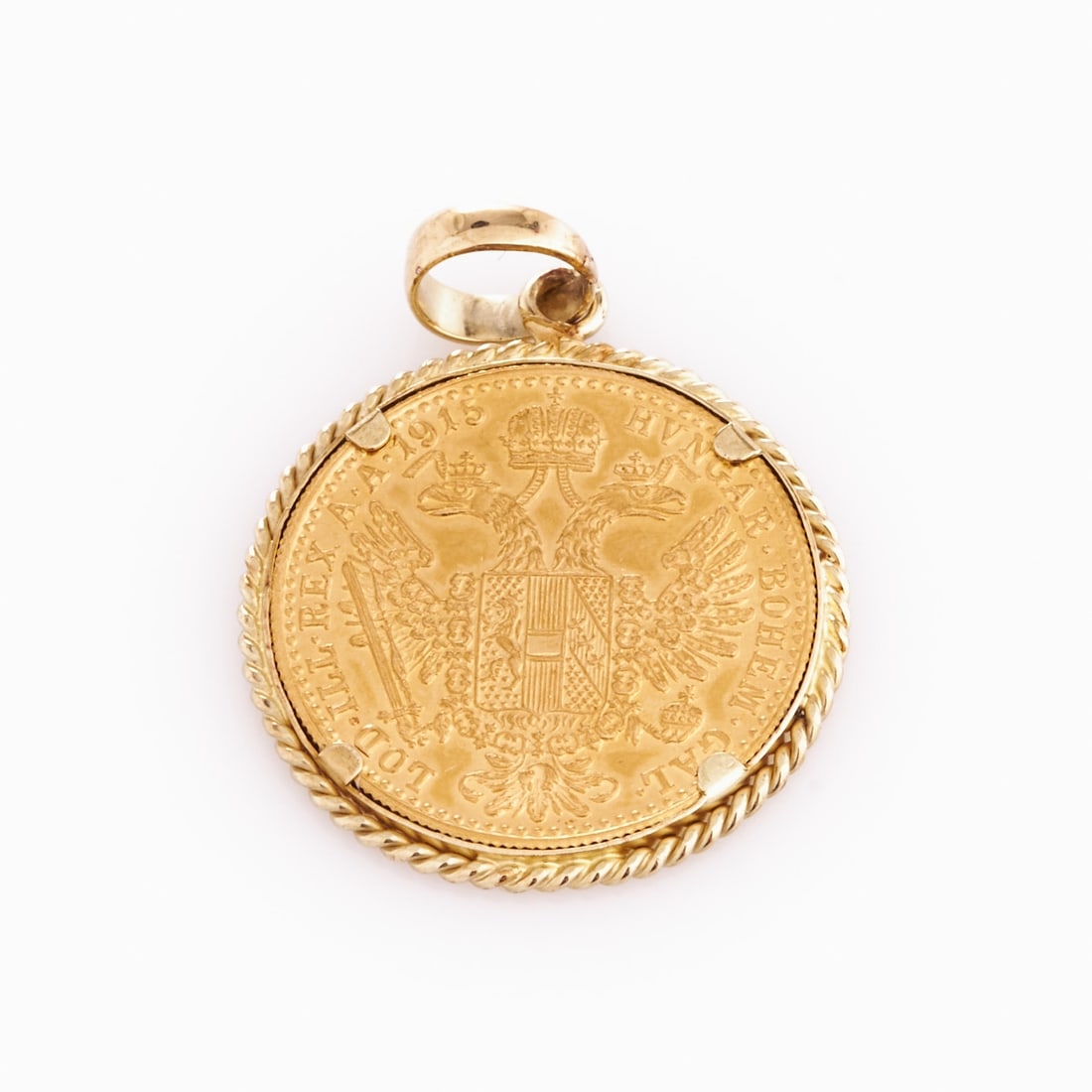 Coin pendant with Franz Joseph of Austria: Coin pendant with Franz Joseph of Austria 585/- yellow gold, hallmarked. Fine gold. Weight: 5 g. D. 2.2 cm. L. 3.1 cm.