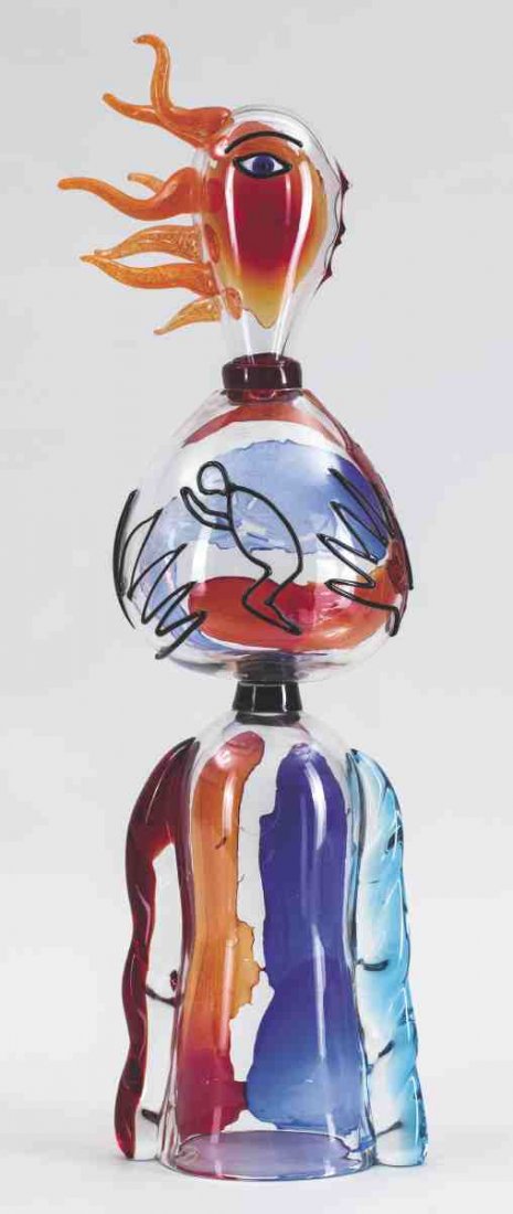 Skulptur 'Schwangere' Mario Badioli, Murano. ...: Skulptur 'Schwangere' Mario Badioli, Murano. Farbloses Glas mit orangen, rotem blauen und violetten Ein- und Aufschmelzungen. Folienaufkleber Vetreria Artistica Badioli Made in Murano. H. 94 cm.