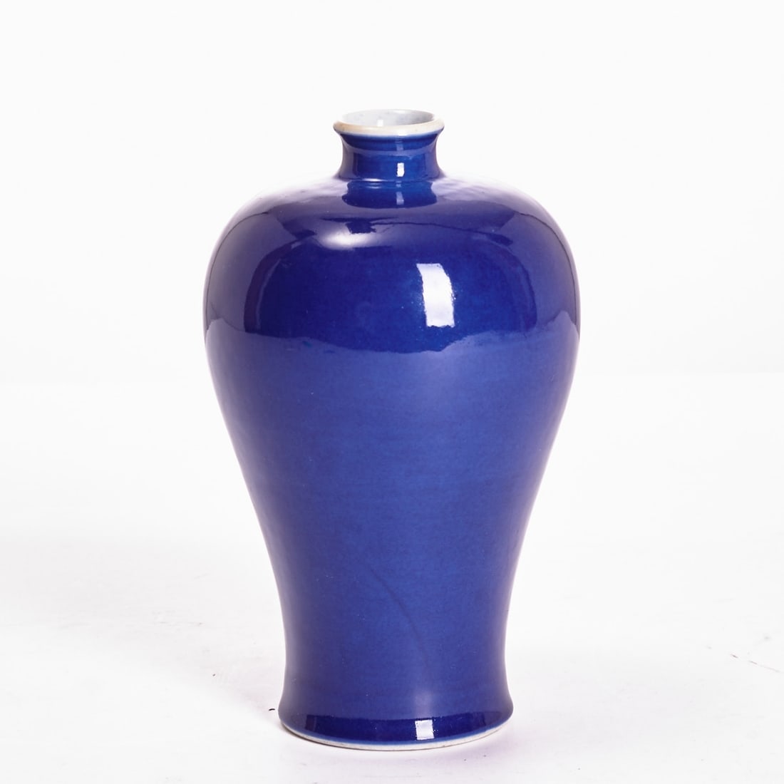 Rare blue-glazed Meiping vase: Rare blue-glazed Meiping vase China, late Qing Dynasty, 19th-20th century. Porcelain with blue glaze. H. 17.5 cm. On the base, a six-character underglaze blue mark: Daqing Qianlong Nianzhi (Made durin