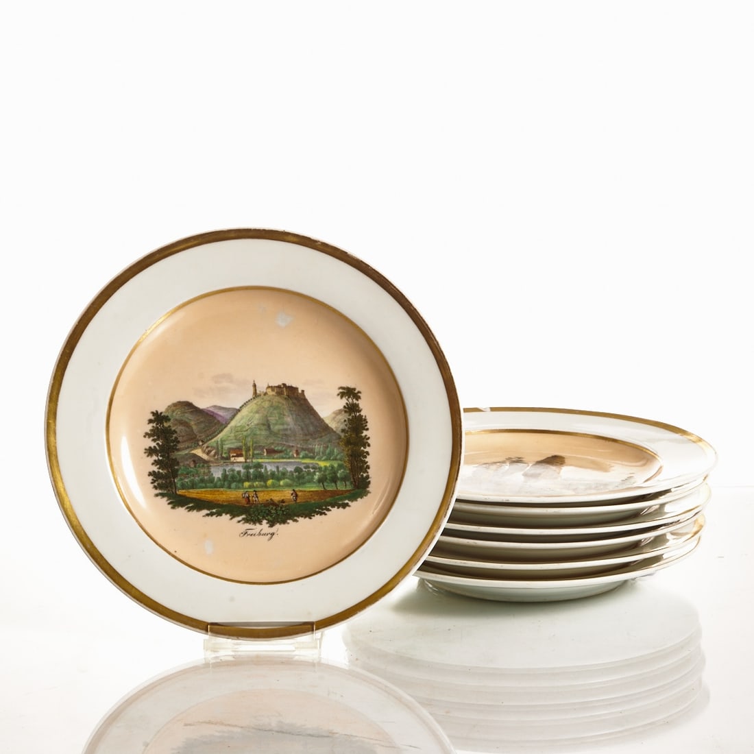 7 different Biedermeier souvenir plates, Royal Porcelain Manufactory, Meissen circa 1830/40: 7 different Biedermeier souvenir plates Royal Porcelain Manufactory, Meissen circa 1830/40. Porcelain, white, glazed. In the center, polychrome colored transfer print decoration on an apricot-colored 