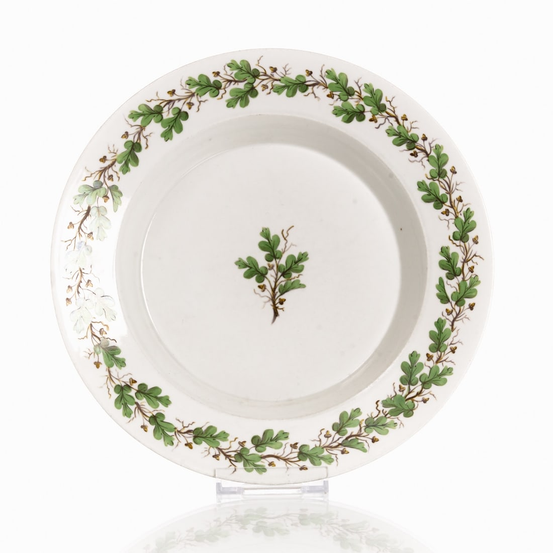 Deep plate - Oak leaves. F??rstenberg, approx. 1780.: Deep plate - Oak leaves Fürstenberg, approx. 1780. Porcelain, white, glazed. Polychrome painted. Blue F mark and 3 under the glaze. 1st choice. H. 4 cm, D. 24 cm. - Condition: Signs of wear - loc