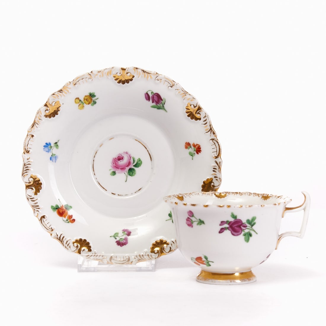 Coffee cup with saucer - Shell relief: scattered flowers, Meissen circa 1840: Coffee cup with saucer - Shell relief: scattered flowers Royal Porcelain Manufactory, Meissen circa 1840. Porcelain, white, glazed. Polychrome and gold painted. Underglaze blue crossed swords mark. 1s