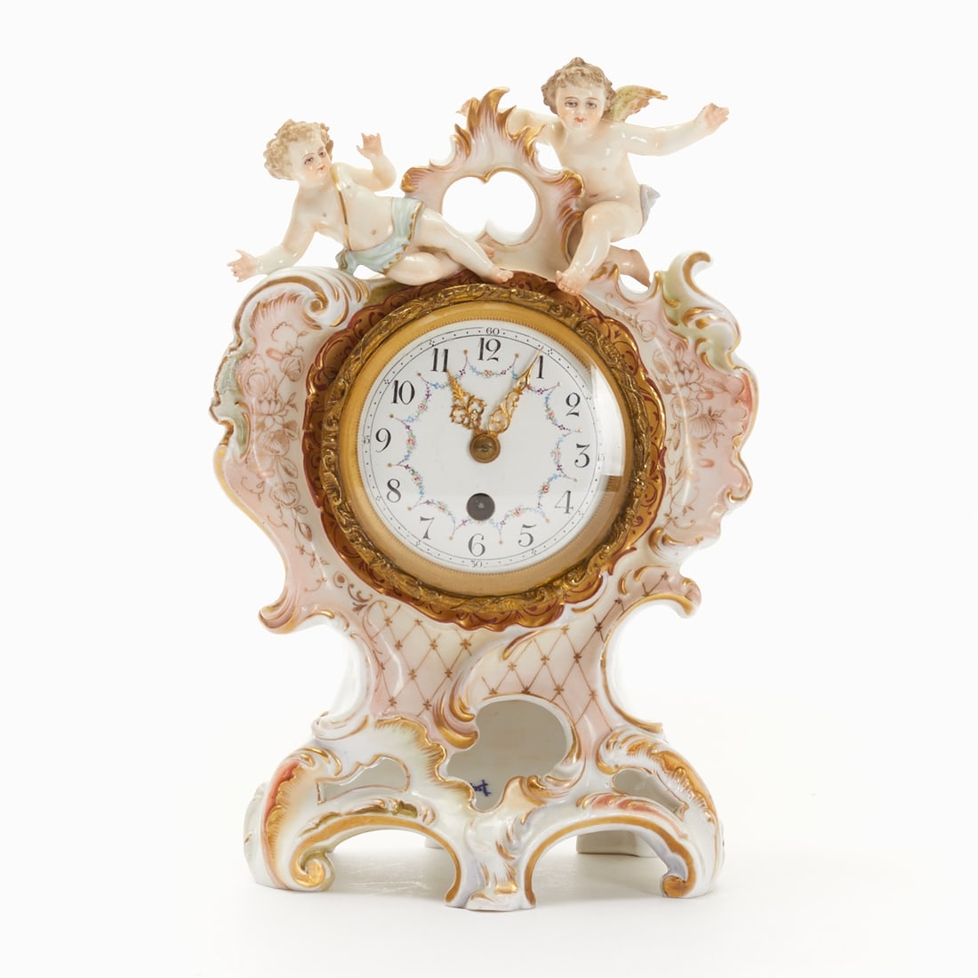 Baroque style table clock with putti pair, E. & A. M??ller, 1890-1938: Baroque style table clock with putti pair Porcelain factory E. & A. Müller, Schwarza-Saale (Thuringia) 1890-1938. Porcelain, white, glazed. Polychrome and gold painted. Underglaze blue mark: 