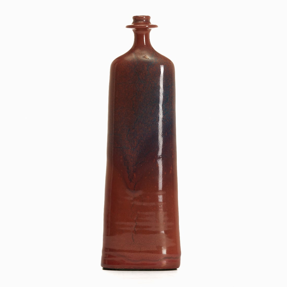 Vase / Bottle - Studio ceramics. Elly Kuch, Burgthann.: Vase / Bottle - Studio ceramics Elly Kuch, Burgthann. Ceramics, dark brown shard. Red-blue running glaze. On the unglazed base: KUCH (impressed). H. 33 cm, W. 10 cm, D. 5.5 cm, D. of opening: 1.5 cm.