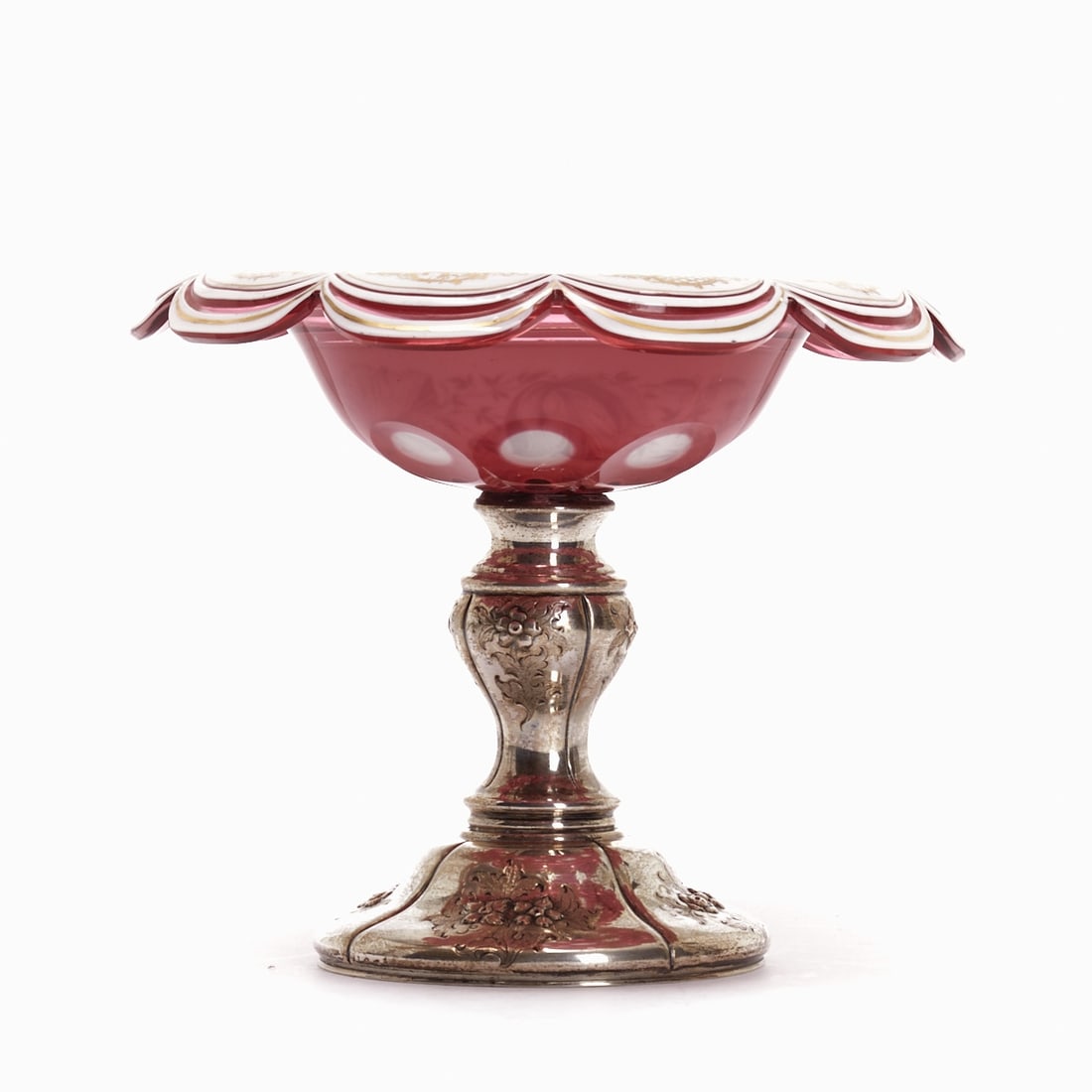 Biedermeier Tazza with arched rim. Circa 1860.: Biedermeier Tazza with arched rim Circa 1860. Foot silver-plated metal. Colorless glass, overlaid with pink glass, overlaid with opaque white glass. Ground-out half-moons and circles. Decorated in