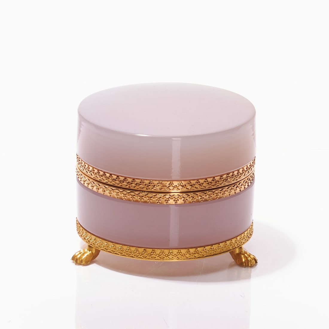 Round lidded box on mounting with lion feet - Art D?©co. France, circa 1935-1940.: Round lidded box on mounting with lion feet - Art Déco France, circa 1935-1940. Thick-walled, alexandrite glass / rare earth oxides neodymium (violet / green) in taupe, slightly translucent, cu