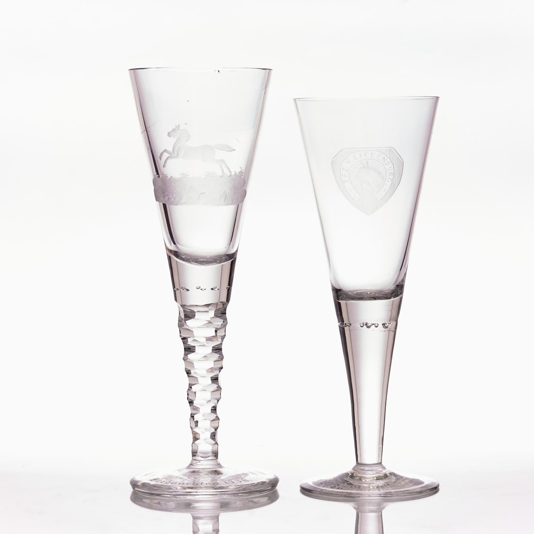 2 Stemmed Glasses - Jumping Horse in Landscape - Liebenburg Horse Breeding. Gr?¤flich: 2 Stemmed Glasses - Jumping Horse in Landscape - Liebenburg Horse Breeding Gr?¤flich Schaffgotsch'sche Josephinenh??tte, Schreiberhau circa 1933. Colorless glass. Round disk foot, inscribed: Weihnach