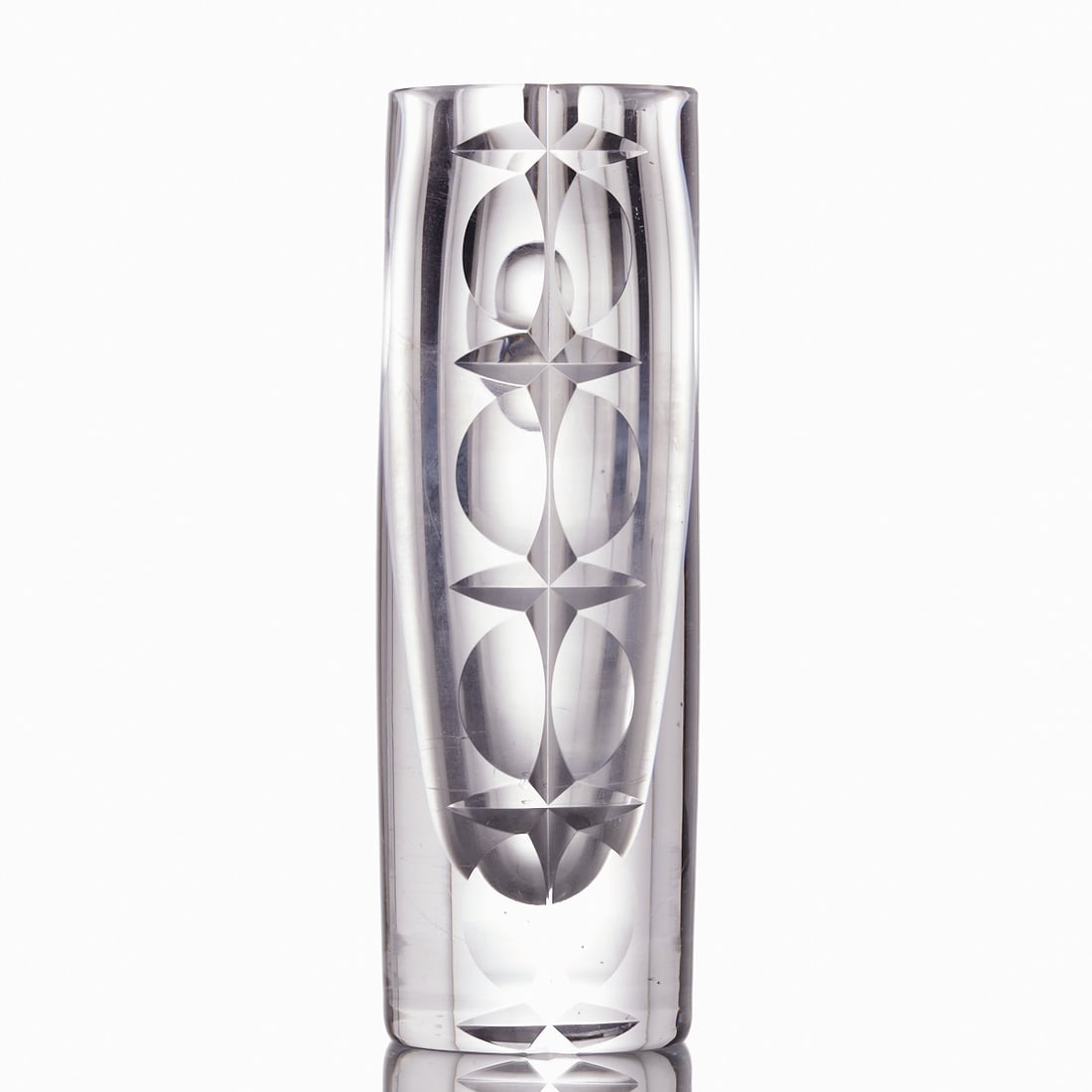 Vase. Mona Morales-Schildt for Kosta 1960s.: Vase Mona Morales-Schildt for Kosta 1960s. Thick-walled, colorless glass, wall with ground facets. Ground pontil mark. Marked on the pontil mark: Kosta W252. H. 20.5 cm, D. of opening: 4 cm. Monica (M