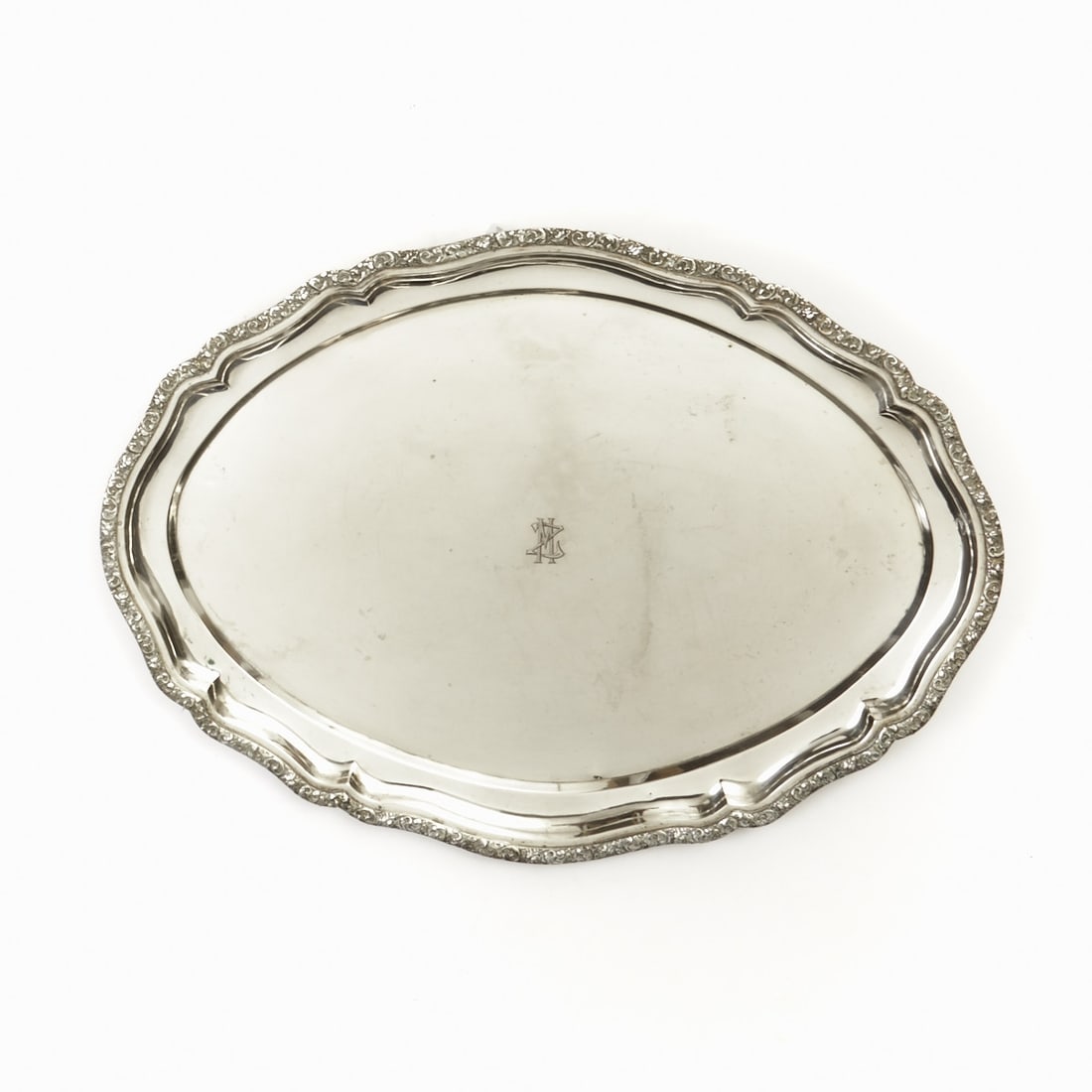 Tray in Baroque Style: Tray in Baroque style Austria, circa 1900. 800 silver. Hallmarks: maker's mark, Diana's head. 2 x 50 x 37 cm. Weight: 1165 g. Monogram.
