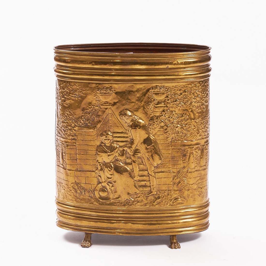 Large Farmhouse Umbrella Stand: Large Farmhouse Umbrella Stand Netherlands, circa 1900. Brass, gold-colored patina. Cylindrical body with all-around plastic relief decoration and figural genre scene. Profiled edges, on four
