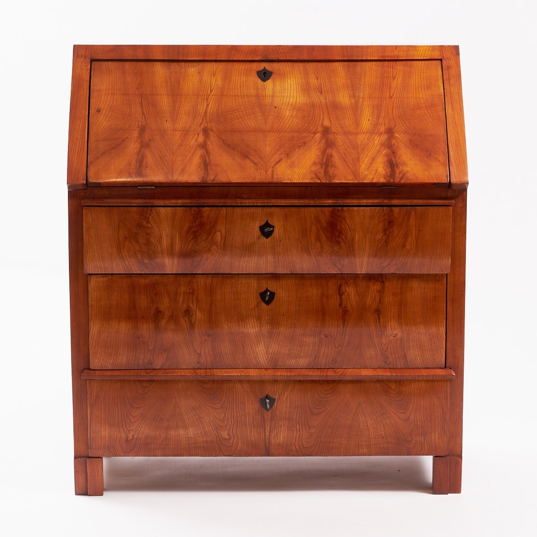 Biedermeier Secretaire: Biedermeier Secretaire Germany, circa 1840. Ash. 112 x 97 x 51 cm. On four block feet. Tall rectangular body with three drawers and a sloping writing surface. Inside, various drawers and storage compa