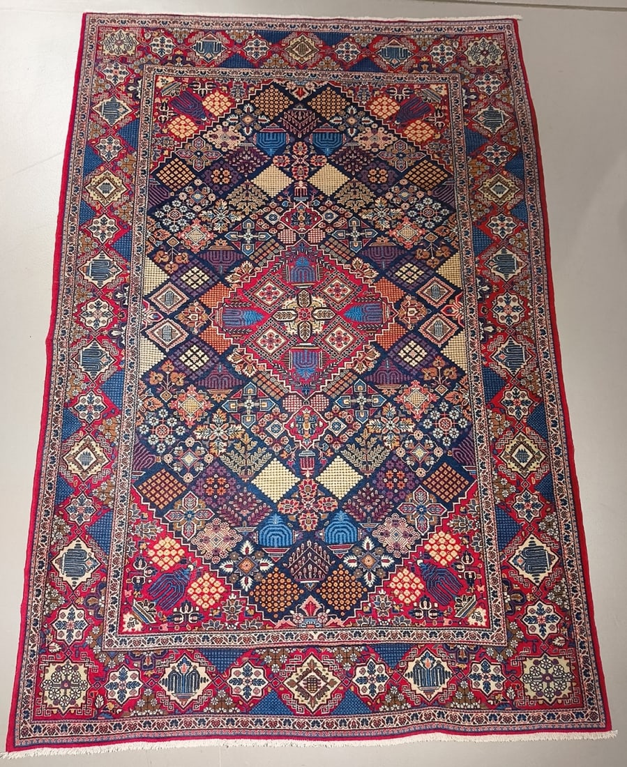 Kashan: Kashan Iran, circa 1950. Cotton on virgin wool. 200 x 137 cm. Medallion pattern with Joshaghan pattern. Aniline dyes, main color in blue, other colors include red, brown, white, green and pink. The ru
