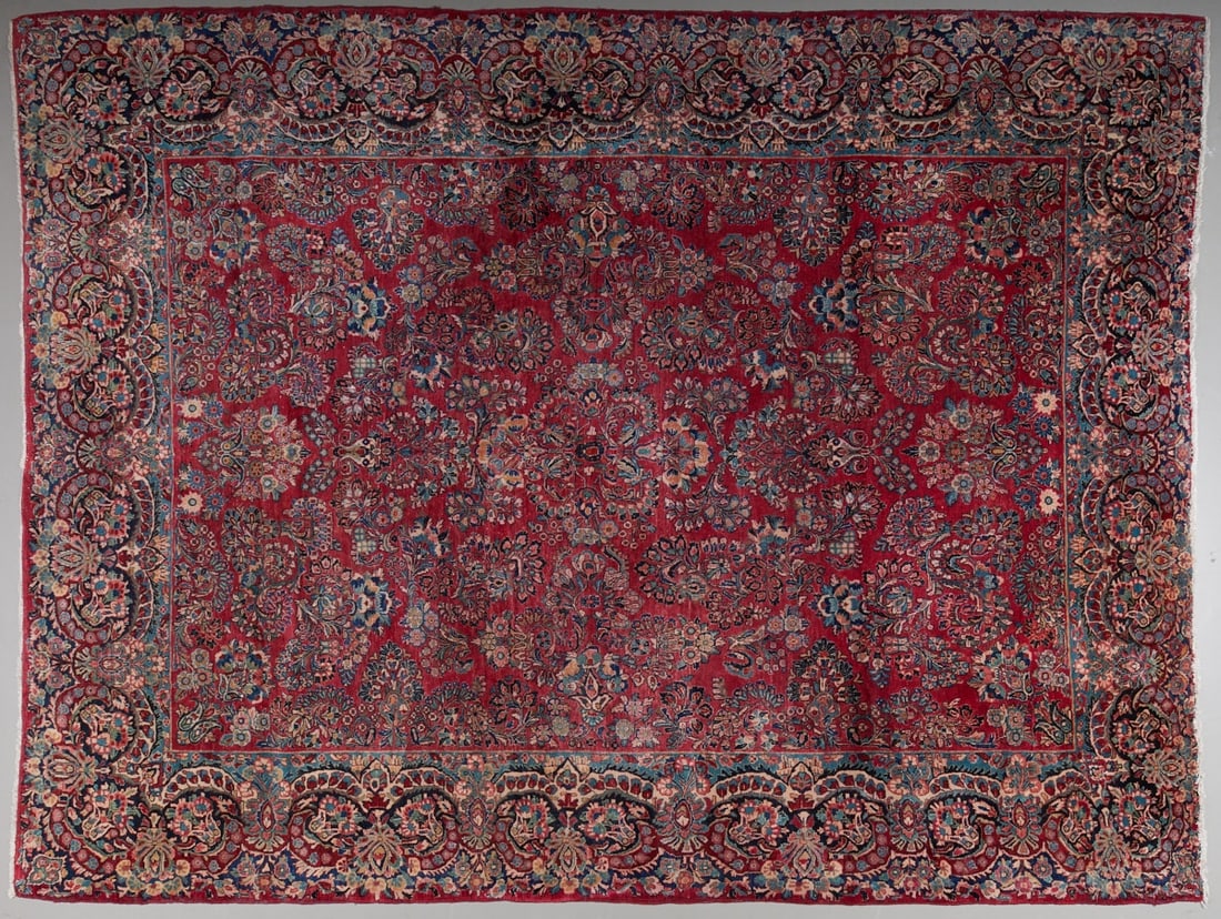 Saruk. Persia, 20th century.: Saruk Persia, 20th century. Virgin wool on cotton, approx. 312 x 413 cm. Abrash, minimally soiled, edges damaged. Curved border, vibrant colors, which give the rug an elegant yet cozy character. An