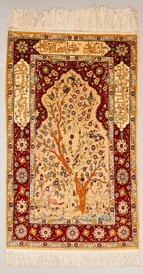 Silk Carpet: Silk carpet Persia, 20th century. Silk, approx. 126 × 76 cm. Finely hand-knotted carpet with a light ground and a central tree of life, richly adorned with flowers, leaf tendrils, and numerous