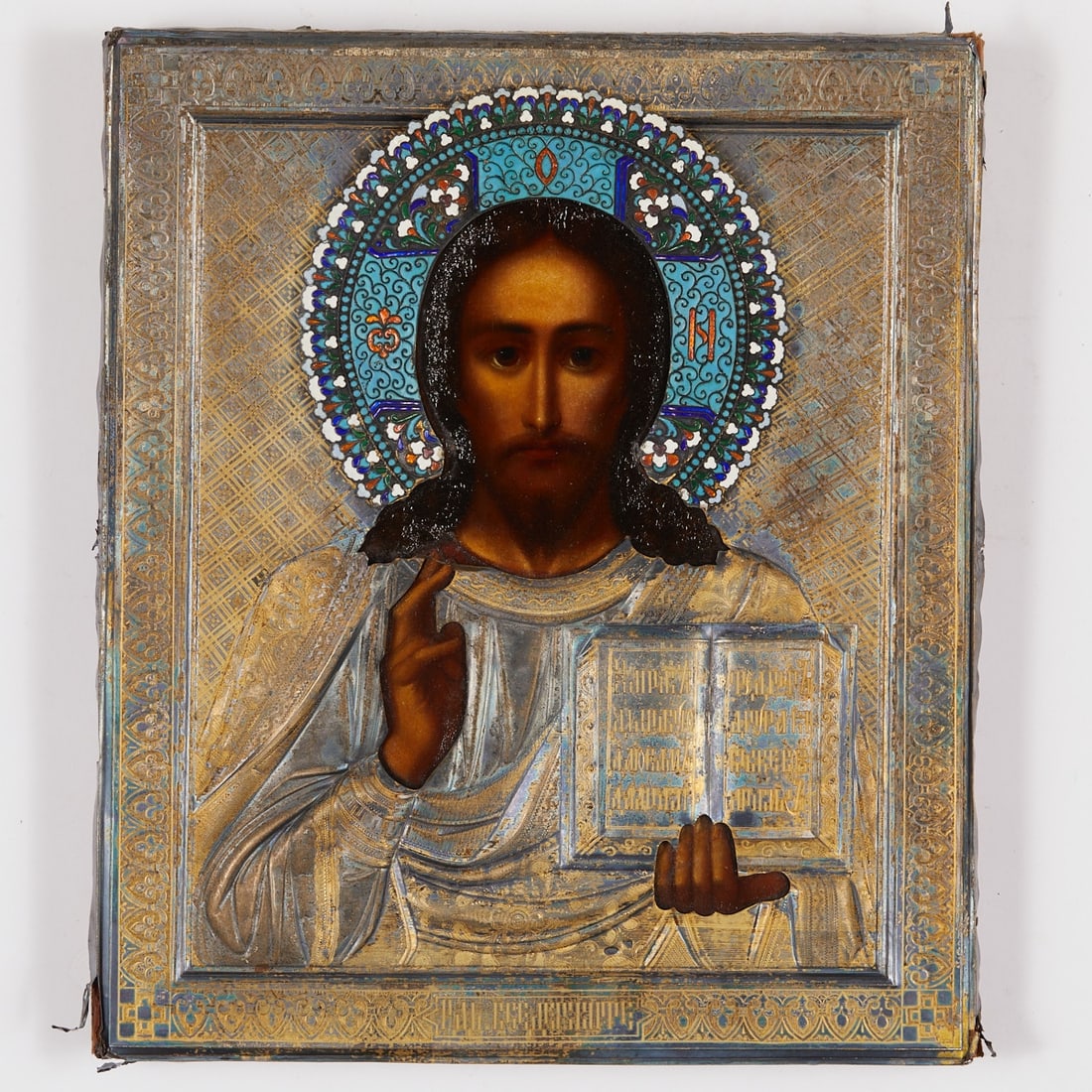 Icon: Icon Russia, probably late 19th century. - Christ Pantocrator - Tempera/wood, silver oklad, gilded. 31 x 27 cm. Christ as a half-figure with a blessing right hand and open Gospel. Richly ornamented si
