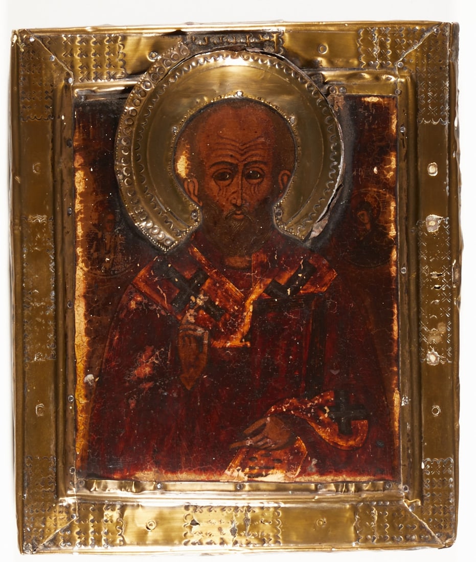 Icon: Icon Russia, 18th/19th century. - Saint Nicholas - Tempera on chalk ground on wood with brass oklad, 31 cm x 25.5 cm. Two (missing) splines on the reverse, rubbed, traces of age.