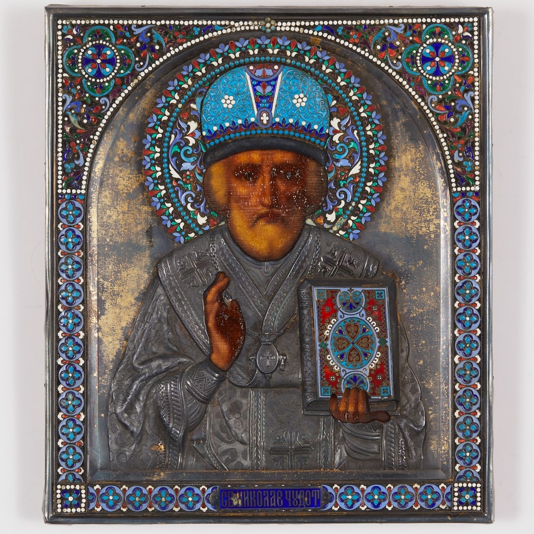 Icon: Icon Russia, late 19th century. - St. Nicholas - Tempera on wood with finely reliefed silver oklad, partially gilded, richly decorated with polychrome cloisonné enamel. Dimensions: 31.2