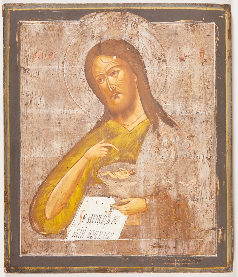 Icon: Icon Russia, 19th century. - John the Forerunner - Egg tempera and silver on chalk ground on wood, 41.5 x 35 cm. Partially rubbed and damaged.