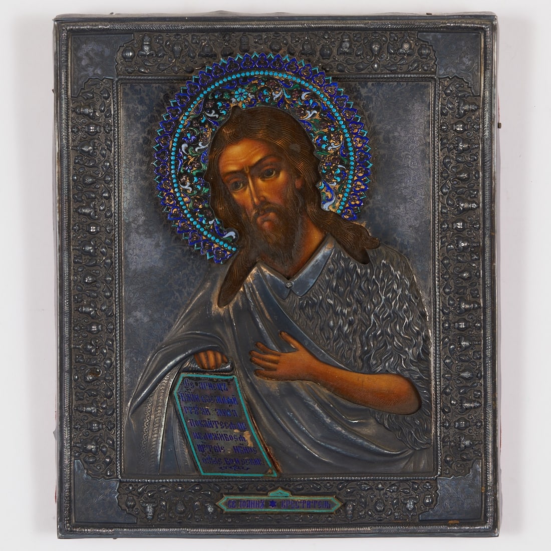 Icon: Icon Russia, late 19th century. - St. John the Baptist - Tempera on wood, silver oklad, relief, partly decorated with polychrome enamel. Depiction of John the Baptist with a cruciform nimbus, in fur