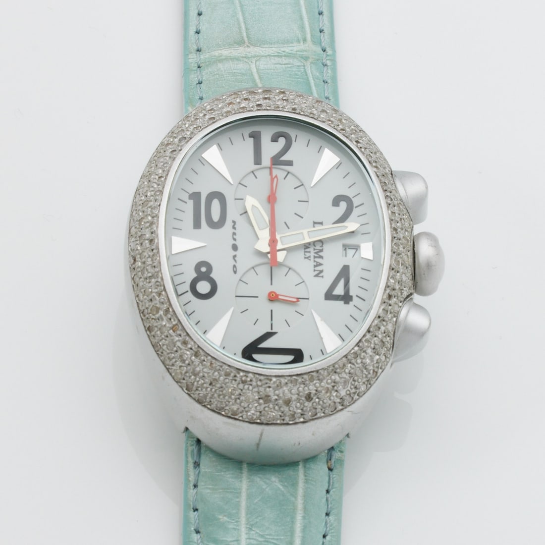 Locman Ladies' Wristwatch: Locman Ladies' Wristwatch Locman company, Italy. Model: Nuovo Quarz. Aluminium. Weight: 56.4 g. Dial marked: Locman, Italy, Nuovo. Reverse marked: Quartz Chronograph, Aluminium Case Ref.014. Case