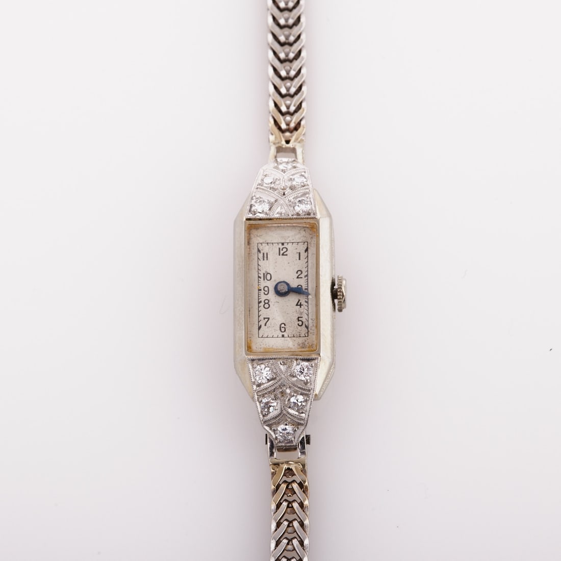 ESTEHA - Ladies' Wristwatch with Diamonds: ESTEHA - Ladies' Wristwatch with Diamonds Art Déco, circa 1920. 750/- white gold, hallmarked. Total weight: 17.05 g. Bracelet not hallmarked. Inner cover marked: Eszeha 76102, 0.750. Movement