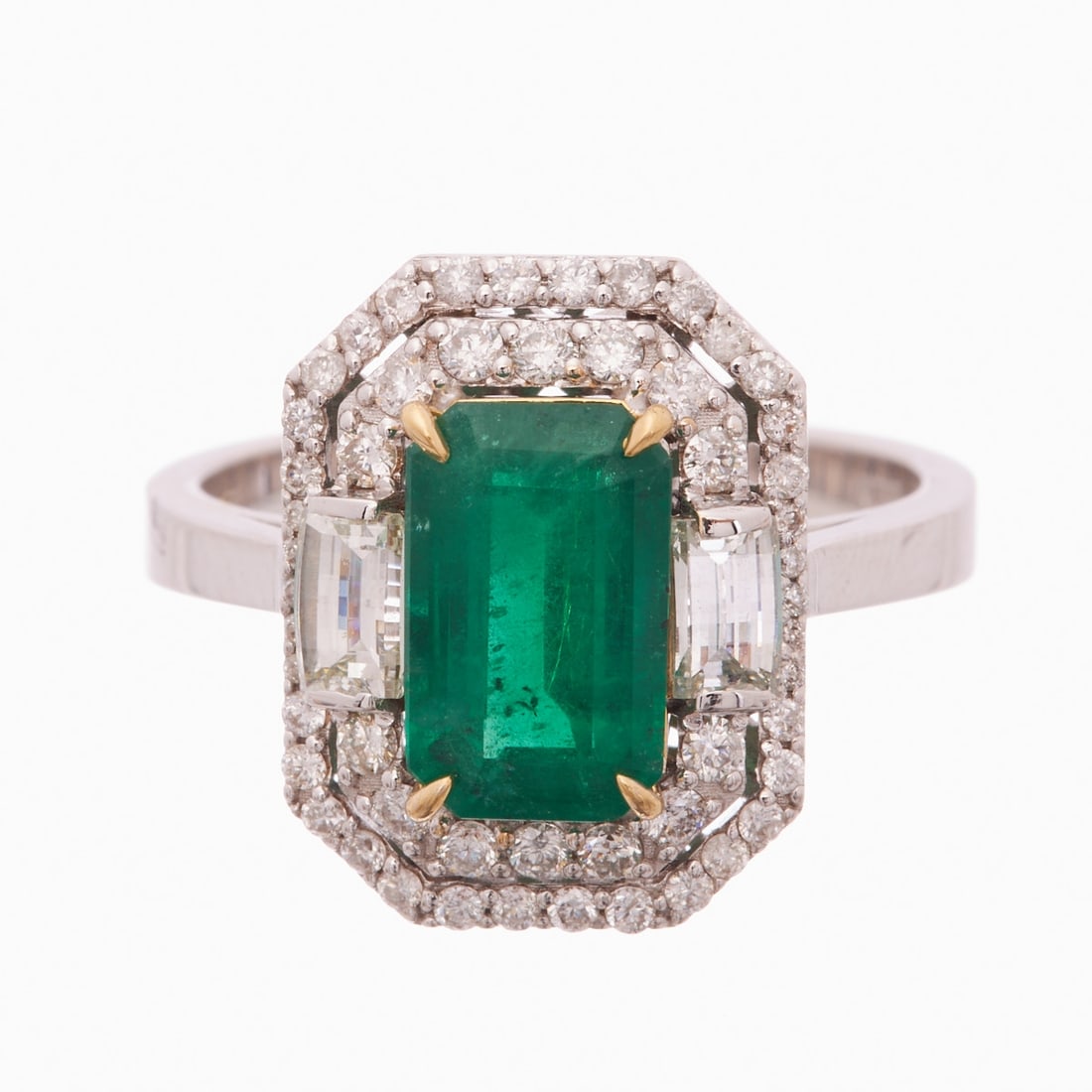 Emerald ring with diamond setting (1 of 2)