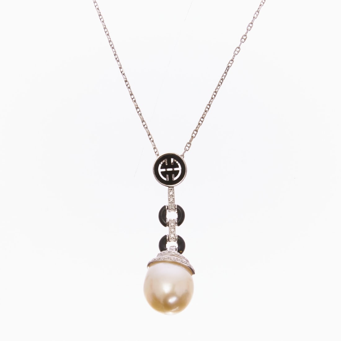 South Sea Pearl, Onyx, and Brilliant-Cut Diamond Pendant with Chain: South Sea pearl, onyx, and brilliant-cut diamond pendant with chain 750/- white gold, stamped. Total weight: 8.5 g. 1 baroque South Sea cultured pearl (approx. 15 x 12.9 mm). 3 onyxes and various