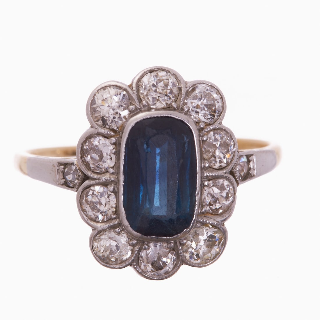 Historical Sapphire-Diamond Ring: Historical Sapphire-Diamond Ring Probably circa 1900. 585/- yellow gold, partially platinum-plated, unstamped, tested. Total weight: 2.7 g. Centrally set sapphire approx. 0.8-1 ct, surrounded by 10