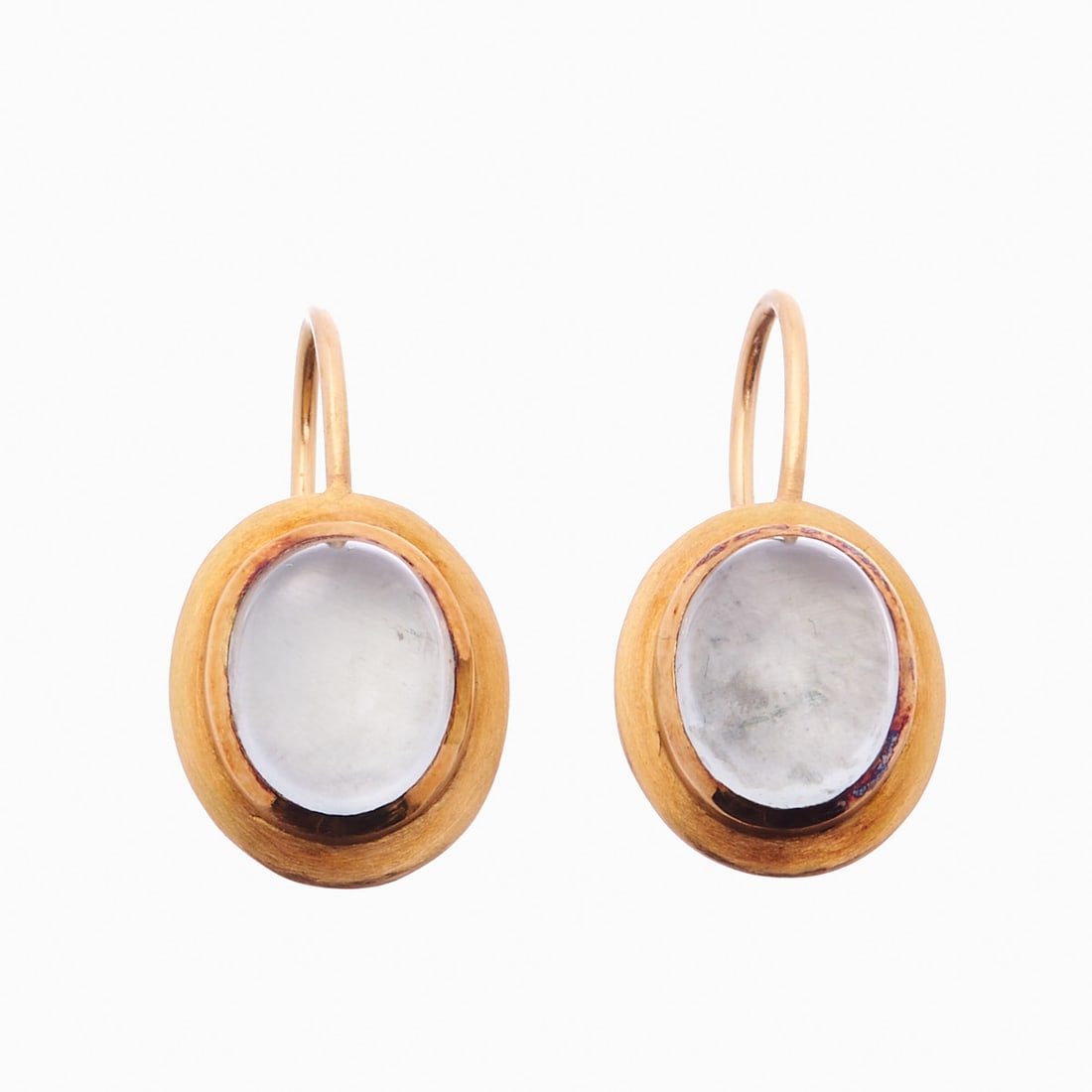 Pair of Designer Earrings with Moonstones: Pair of designer earrings with moonstones 750/- yellow gold, stamped. Weight 8.1 g. Two moonstones in cabochon cut (dimensions 1 x 0.78 cm) in a smooth setting. Length 2.2 cm. Studs. Very good
