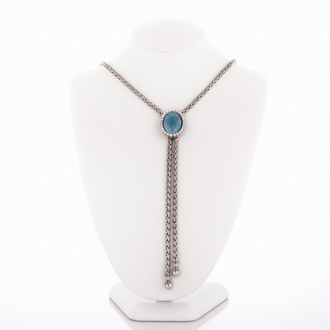 Long Necklace with Opal and Brilliant-Cut Diamonds: Long necklace with opal and brilliant-cut diamonds 585/- white gold, stamped. Total weight: 63.4 g. 1 opal triplet in cabochon cut. Approx. 28 brilliant-cut diamonds total approx. 1 ct. Pendant