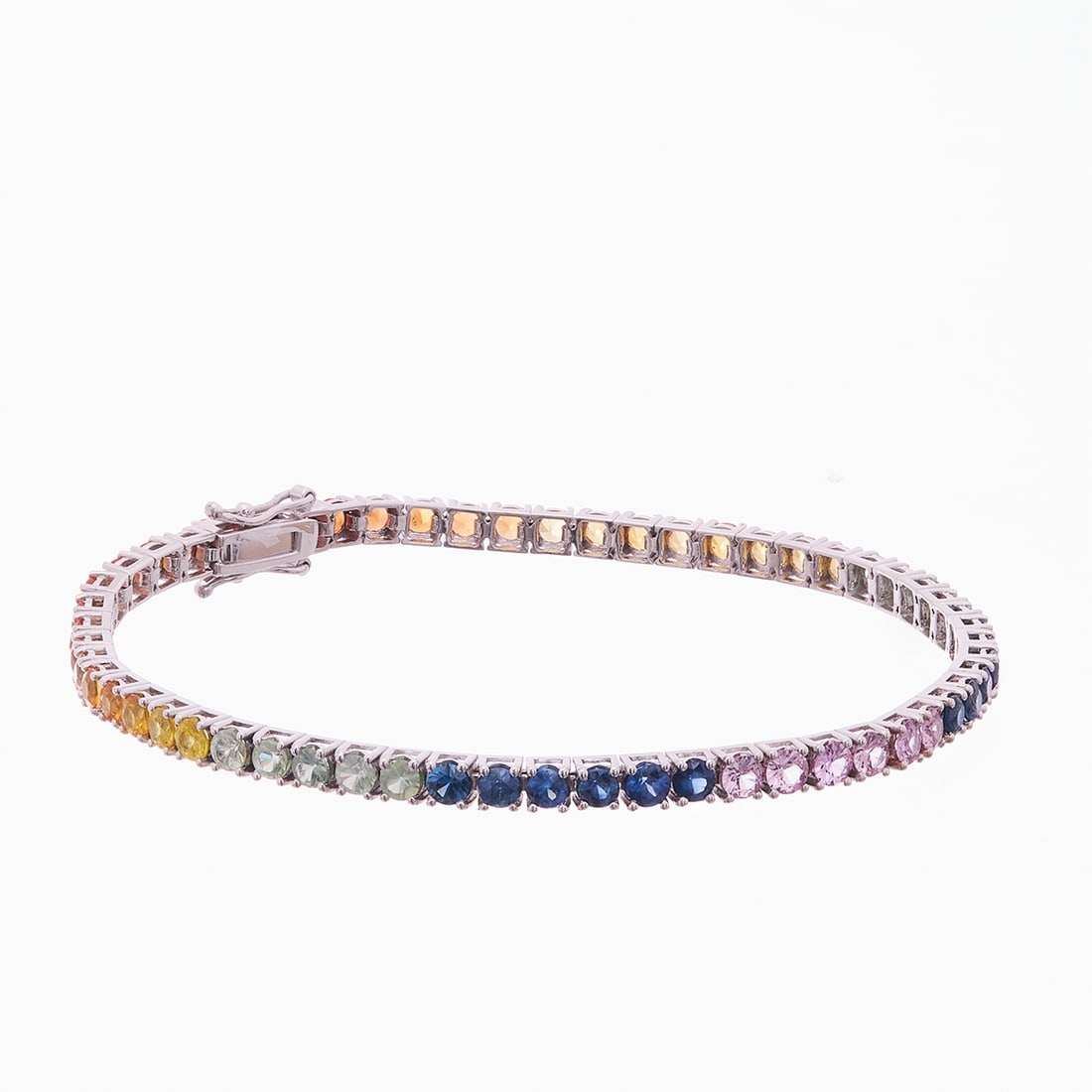 Sapphire Bracelet: Sapphire Bracelet 585/- white gold, stamped. Total weight: 9.73 g. 57 sapphires totaling approx. 7.35 ct, each approx. 3 mm. L. approx. 19 cm. Very good condition. Classic-elegant bracelet with