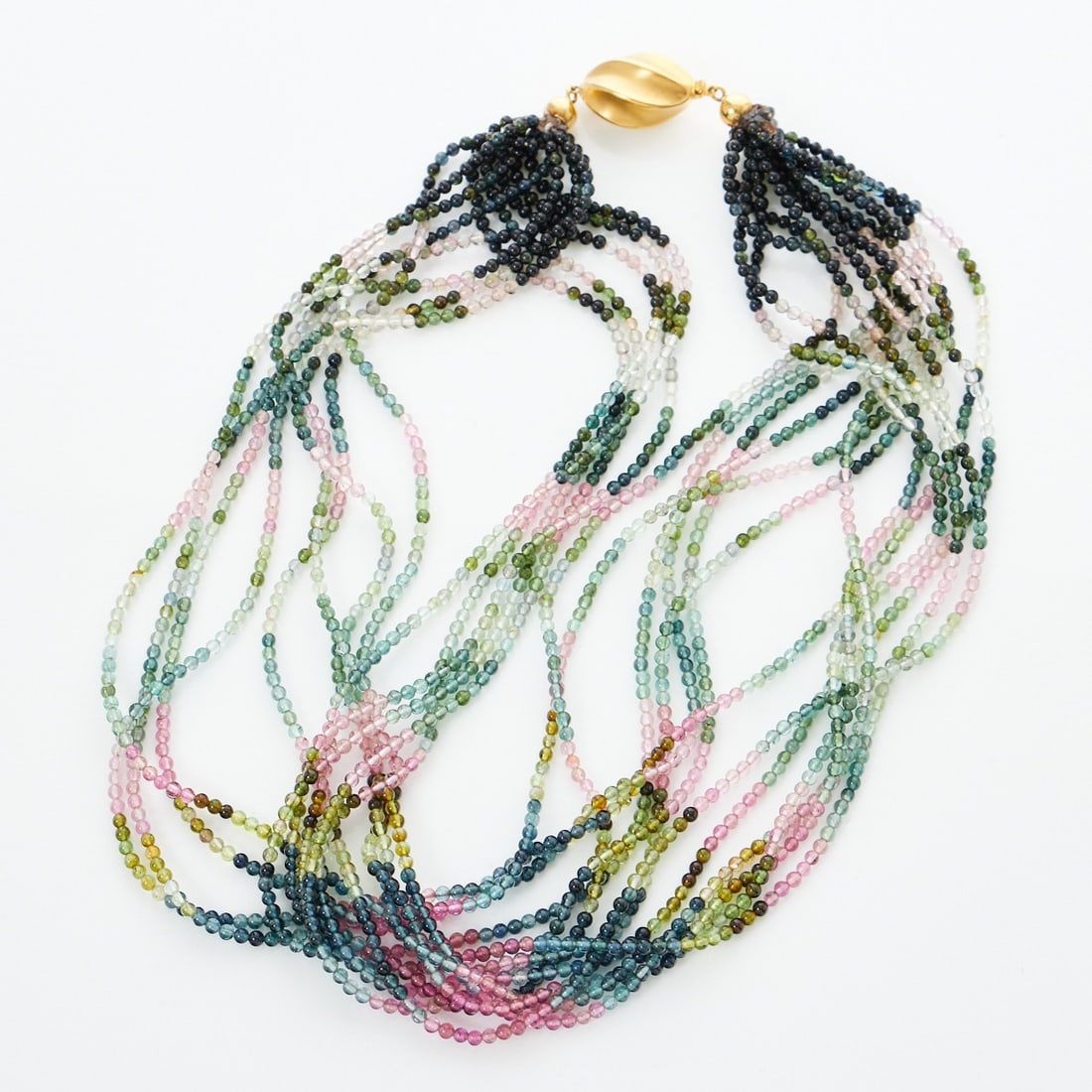 Beautiful Tourmaline Necklace: Beautiful Tourmaline Necklace with 13 Strands 585/- yellow gold, stamped. Weight: 53 g. Various tourmalines in dark and light green/rose/pink. Length: 43.5 cm. Width: 1.4 - 2 cm. Box clasp. Very good