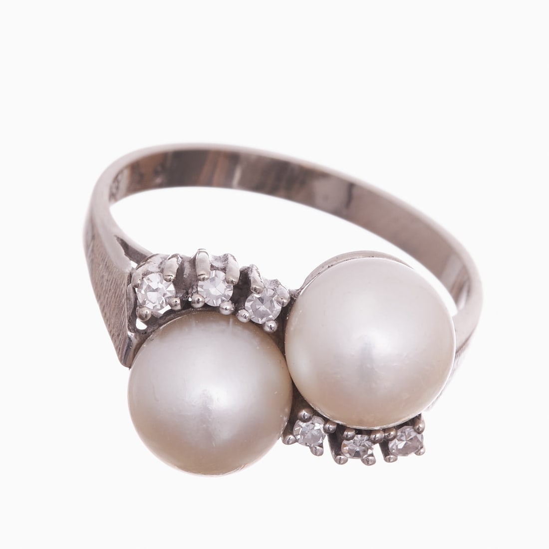 Pearl Ring with Brilliants: Pearl Ring with Brilliants 585/- white gold, stamped. Hallmark. Weight: 5.1 g. 2 pearls (diam. 0.8 cm). 6 small brilliants, totaling approx. 0.18 ct. Ring size 56. Very good condition.