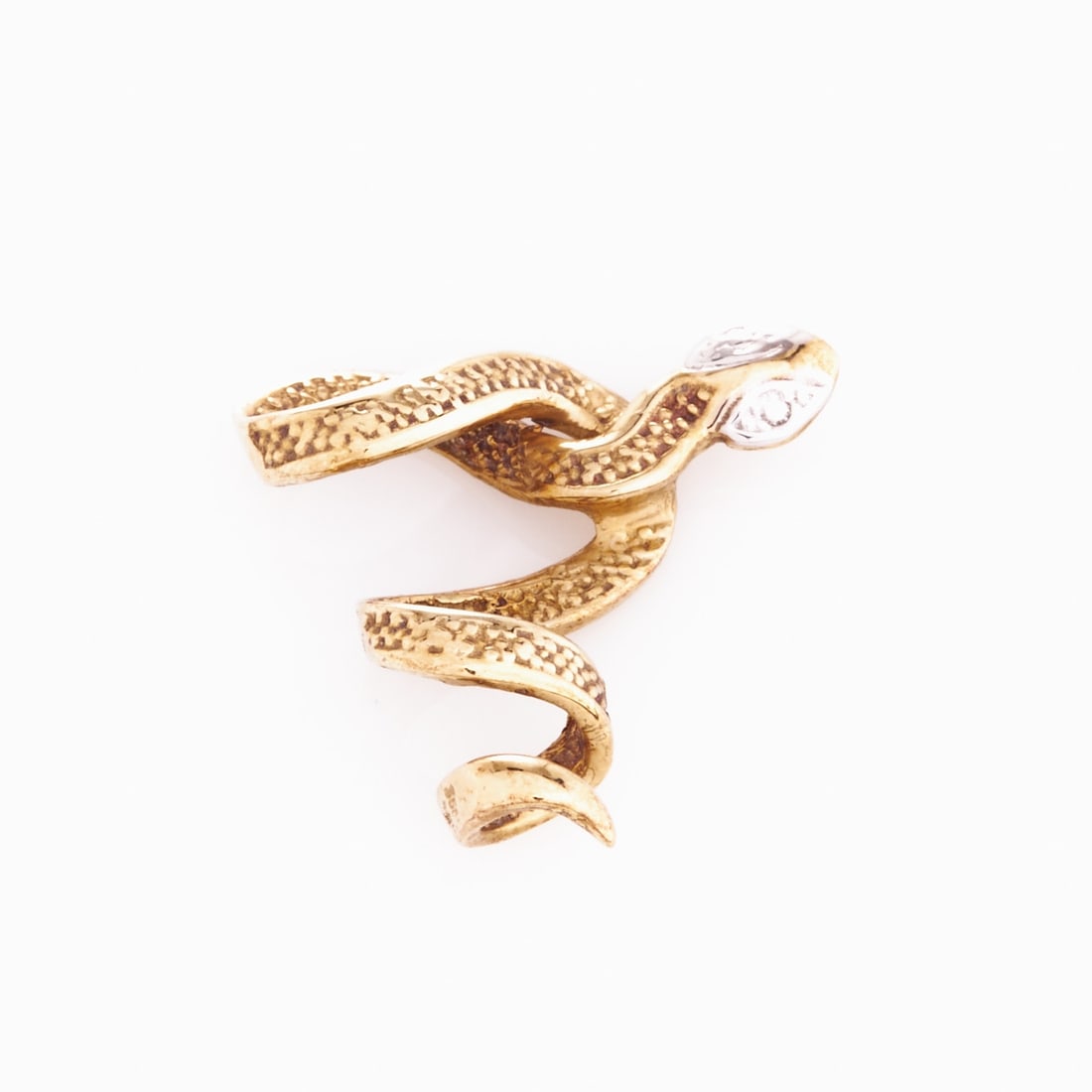 Serpentine pendant: Serpentine pendant 585/- yellow gold, unstamped. Weight: 2.1 g. Dimensions: 2 x 2.2 cm. Good condition. Decorative pendant in the form of a stylized snake made of 585/- yellow gold. The curved design