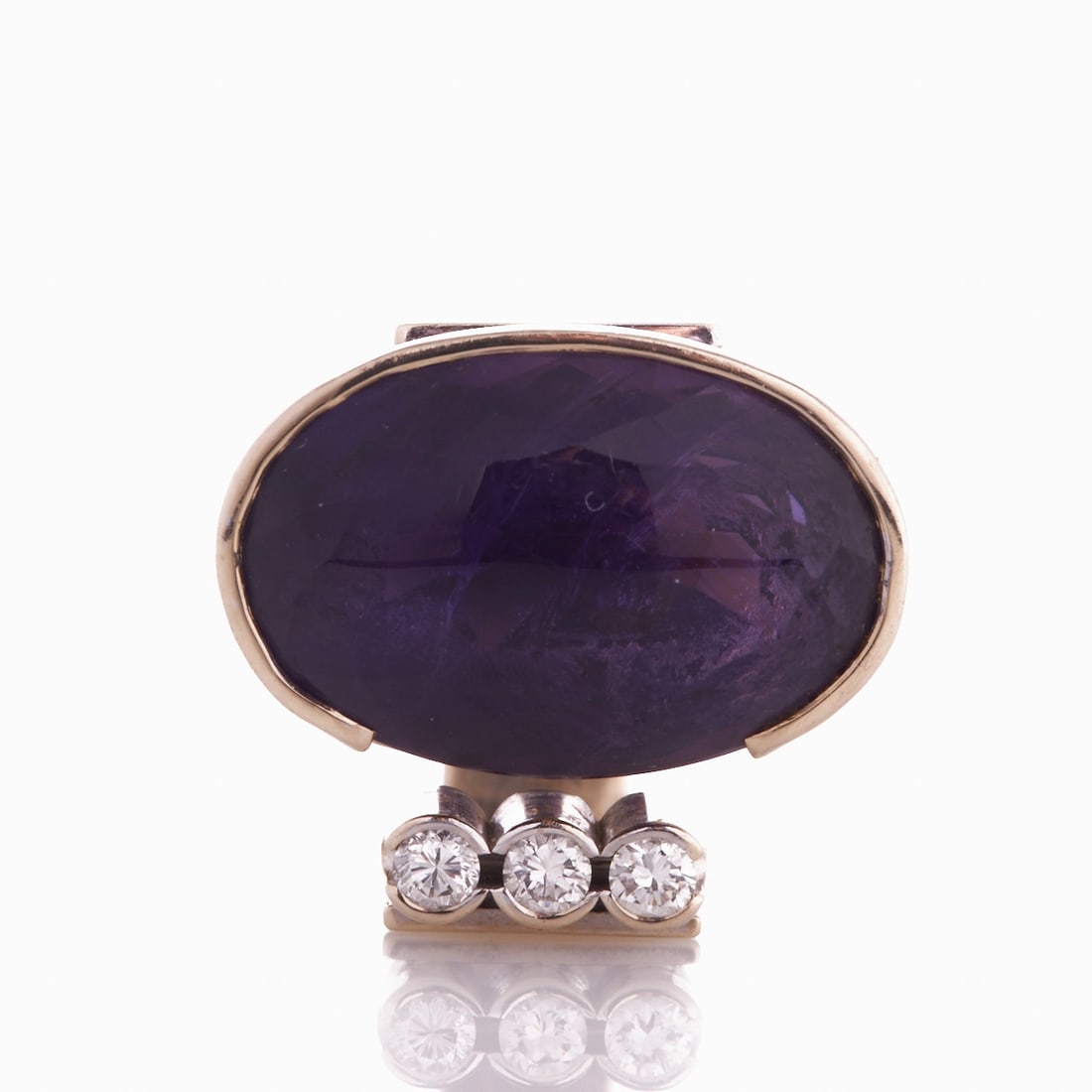 Amethyst ring: Amethyst ring Goldschmiede Herbert Bitter, Hanover. 750/- white gold, stamped. Weight: 19.8 g. Hallmark: 750 HB in a circle. 1 oval cut amethyst totalling approx. 19 ct. 3 brilliant-cut diamonds