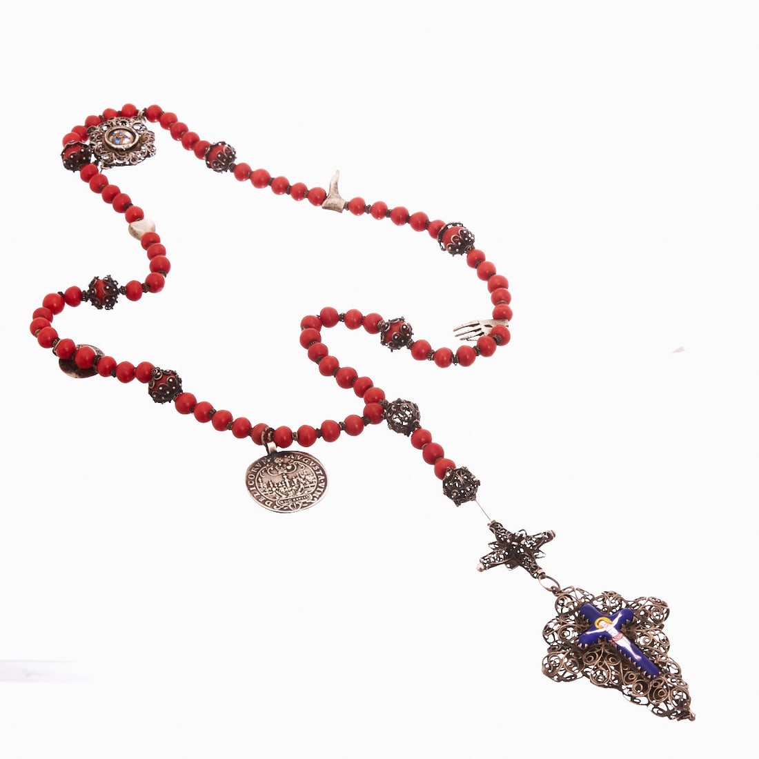 Coral rosary with silver filigree and enamel cross Probably Southern Europe, 19th/early 20th: Coral rosary with silver filigree and enamel cross Probably Southern Europe, 19th/early 20th century. Silver. L. 69 cm + 17 cm. Signs of wear. Red coral beads in different sizes, partly set with