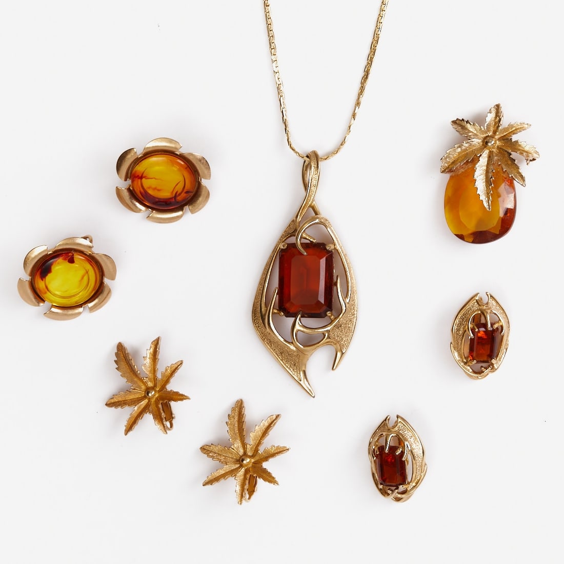 SARAH COVENTRY - Vintage Jewelry Sets with Faux Citrines (5 Pieces): SARAH COVENTRY - Vintage jewelry sets with faux citrines (5 pieces) 1 necklace with pendant, 1 brooch and 3 pairs of ear clips. Sarah Coventry Co., USA; circa 1960. Metal, gold-colored. Glass. Weight: