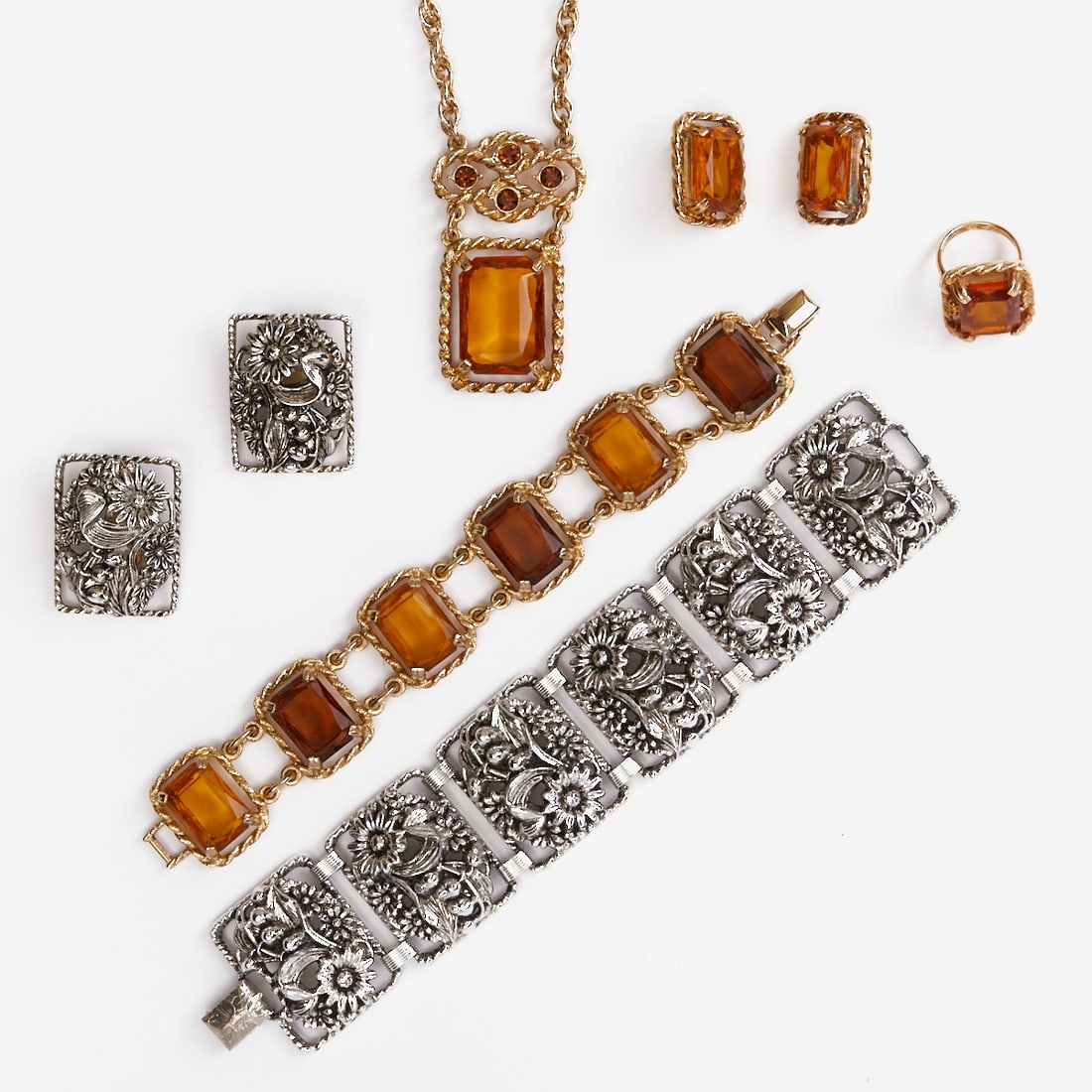 SARAH COVENTRY - Two Vintage Jewelry Sets (6 pieces): SARAH COVENTRY - Two Vintage Jewelry Sets (6 pieces) 1 necklace, 1 bracelet, 1 ring and 2 pairs of ear clips. Sarah Coventry Co., USA; circa 1960. Metal, silver-/gold-coloured. Rhinestones. Weight: 23