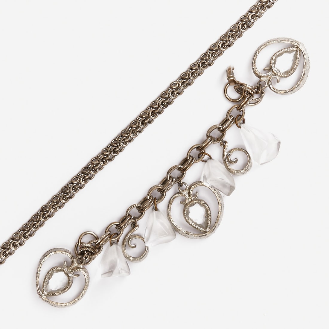 Silver-colored Vintage Necklace and Bracelet: Silver-colored Vintage Necklace and Bracelet Probably circa 1950. Metal, silver-colored. Lucite. Weight: 145 g. Necklace length 46 cm. Width 1 cm. Bracelet length 17 cm. Width 1.8 cm. Bracelet length 