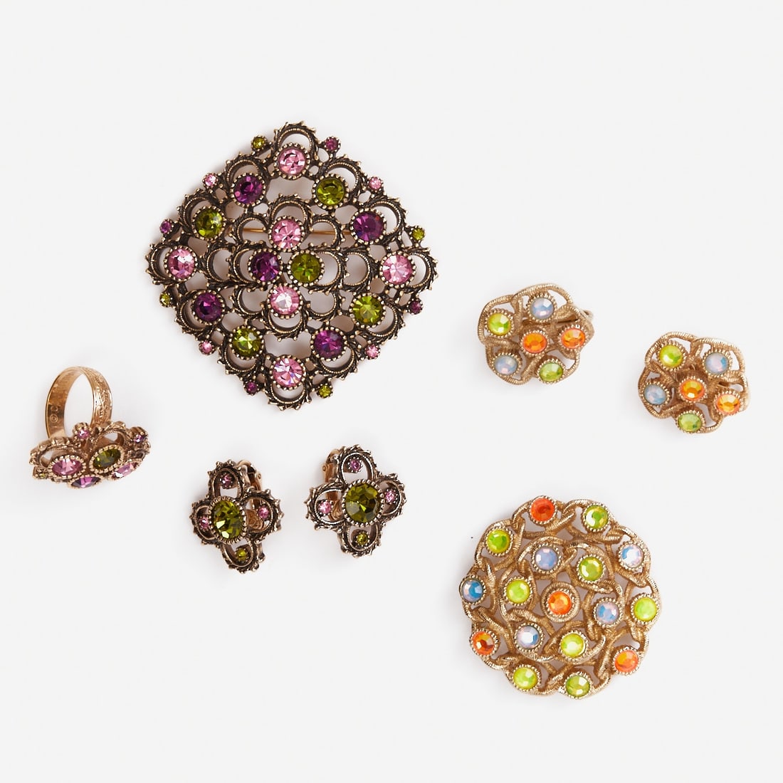 SARAH COVENTRY - Two Vintage Jewelry Sets with Colorful Rhinestones (5 pieces): SARAH COVENTRY - Two Vintage Jewelry Sets with Colorful Rhinestones (5 pieces) 2 brooches, 1 ring, and 2 pairs of ear clips. Sarah Coventry company, USA; circa 1960. Metal, gold-colored. Rhinestones. 