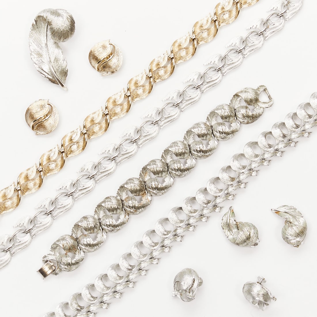 LISNER - Three vintage parures with feather motif (7 pieces) (1 of 2)