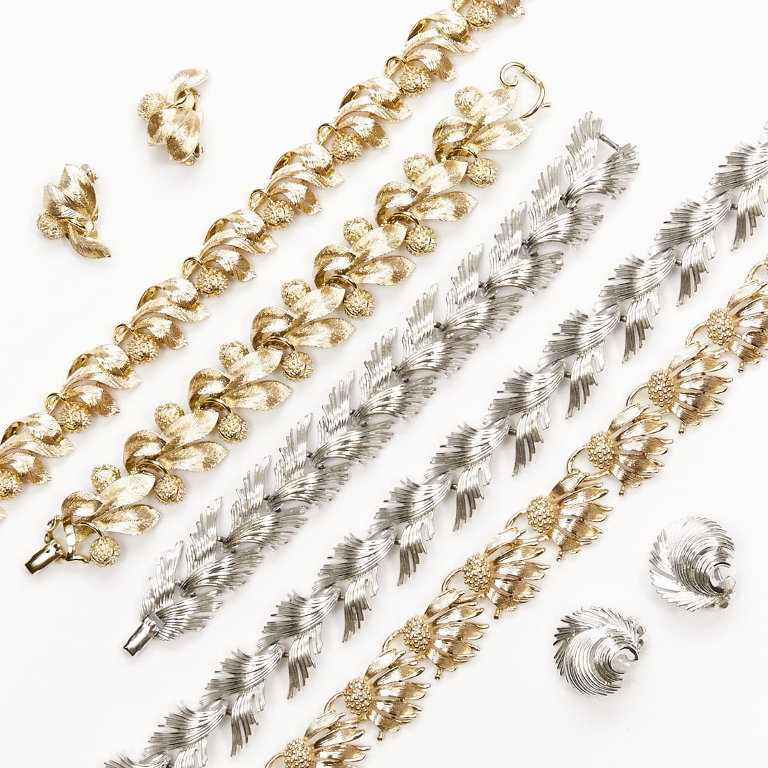 LISNER - Three Vintage Parures with Feather and Fruit Motifs (7 pieces) (1 of 2)