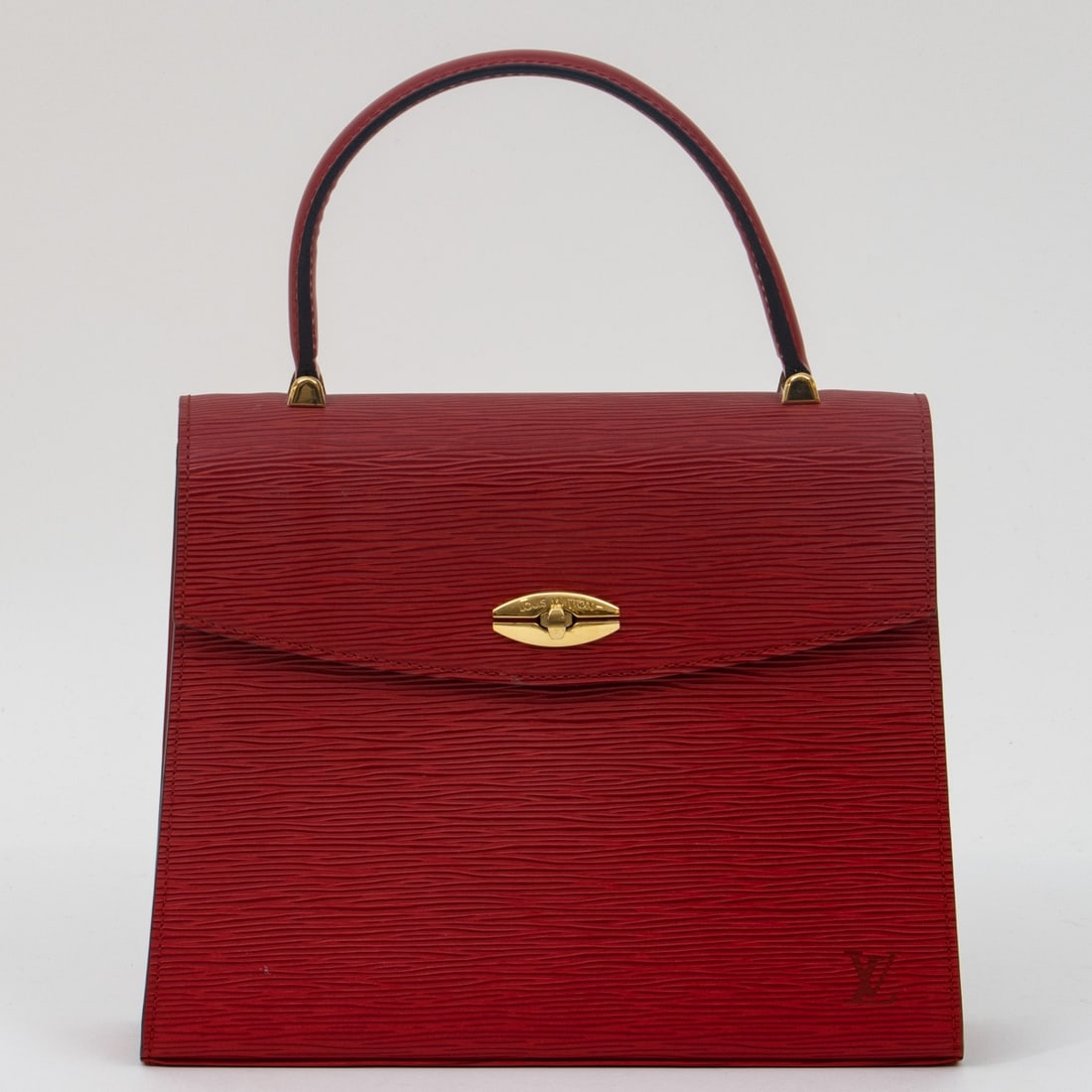 LOUIS VUITTON - Handbag 'Malesherbes': LOUIS VUITTON - Handbag "Malesherbes" Louis Vuitton, Paris, France, 1995. Model: Malesherbes, Red. Exterior material: textured Epi leather, calfskin lining, gold-colored metal fittings. Code