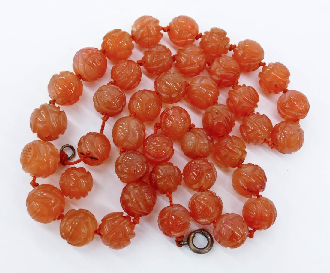 Strand of Chinese Carnelian Shou Beads 23''. Includes (1 of 3)