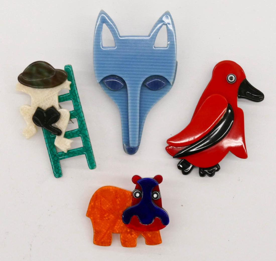 4pc Lea Stein Various Animals Plastic Brooches. Sizes: 4pc Lea Stein Various Animals Plastic Brooches. Sizes range from 1.5'' to 2.5'' long. Includes a fox head, penguin, hippo, and frog on ladder. Overall excellent condition.