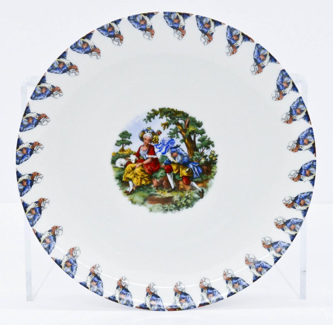 Howard Kottler (1930-1989 Washington) ''The Leacher'': Howard Kottler (1930-1989 Washington) ''The Leacher'' Porcelain Decal Plate 10''x1''. A scarce altered decal plate with rim decoration. Signed with decal on verso. Excellent condition.