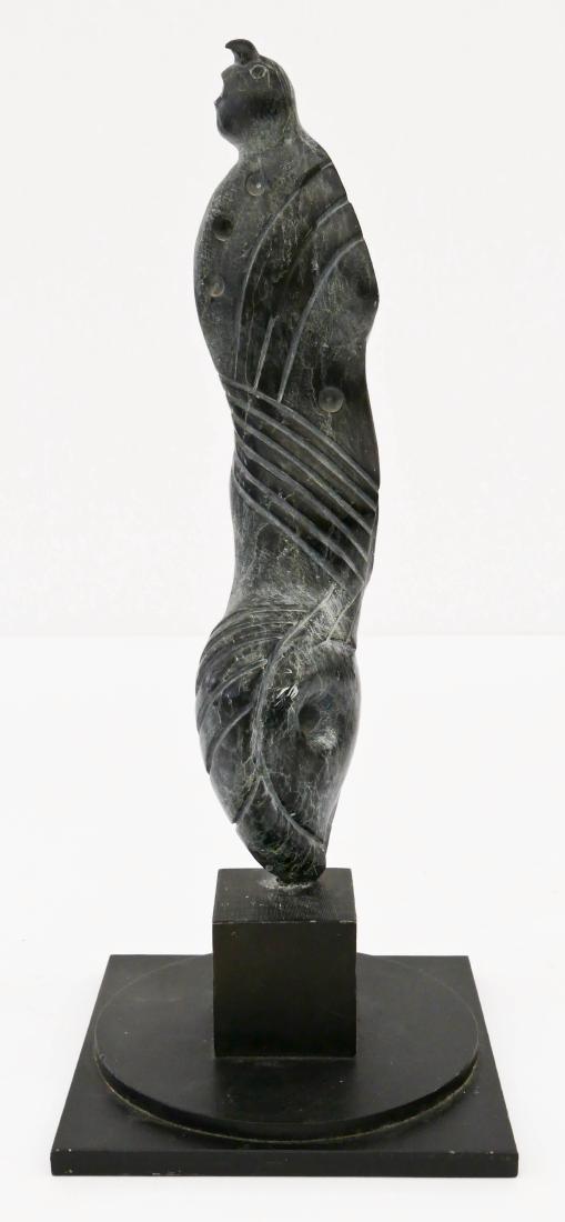 Inuit Abstract Figure Soapstone Sculpture on Base: Inuit Abstract Figure Soapstone Sculpture on Base 14.5''x6''. Anthropomorphic figure of whale form turning to figure. Unsigned. Some scattered scratching.