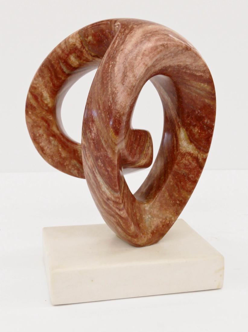 Sam Charin (20th Cent. American) ''Eternity'' Red: Sam Charin (20th Cent. American) ''Eternity'' Red Alabaster Sculpture 15''x11''. Initialed at base. Excellent condition.