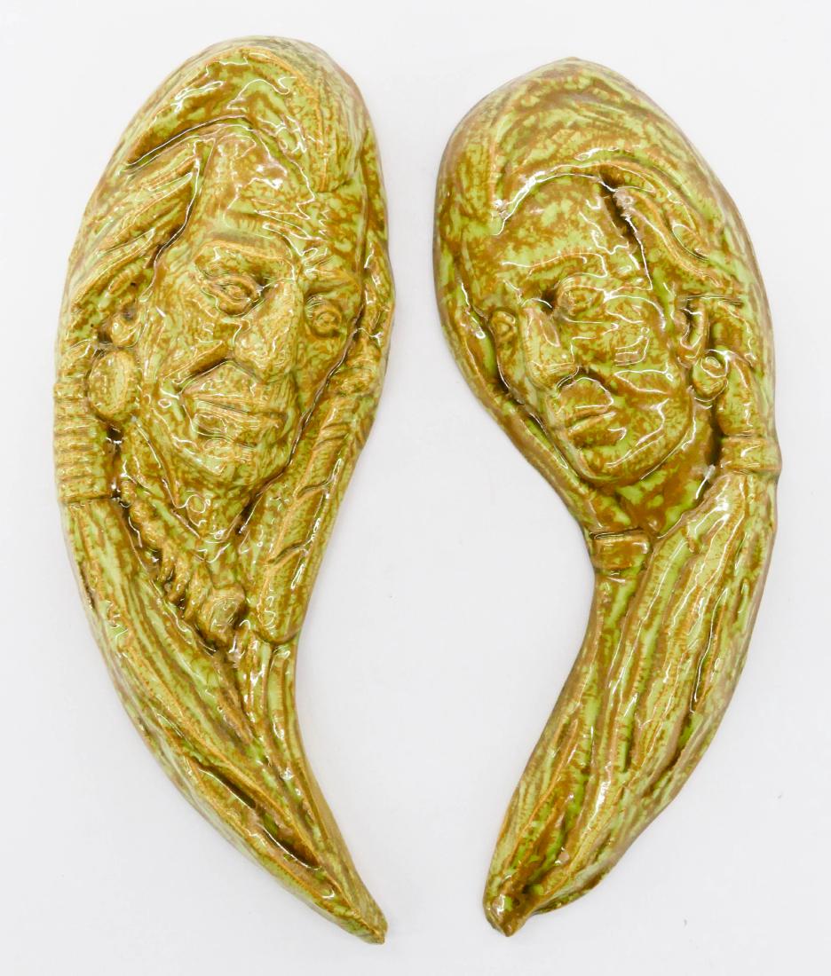 Ace Powell (1912-1978 Montana) Pair of Native Ceramic: Ace Powell (1912-1978 Montana) Pair of Native Ceramic Plaques 10''x4'' Each. Chief and squaw portrait plaques in green and brown mottled glazes. Incised signature on back. Excellent condition.