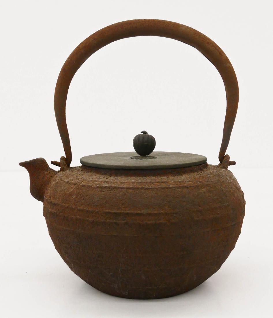 Japanese Tetsubin Kettle with Bronze Lid 8.5''x7''.: Japanese Tetsubin Kettle with Bronze Lid 8.5''x7''. Cast iron body with signature under lid. Heavy wear from use. 18th or 19th century, Edo or Meiji period.